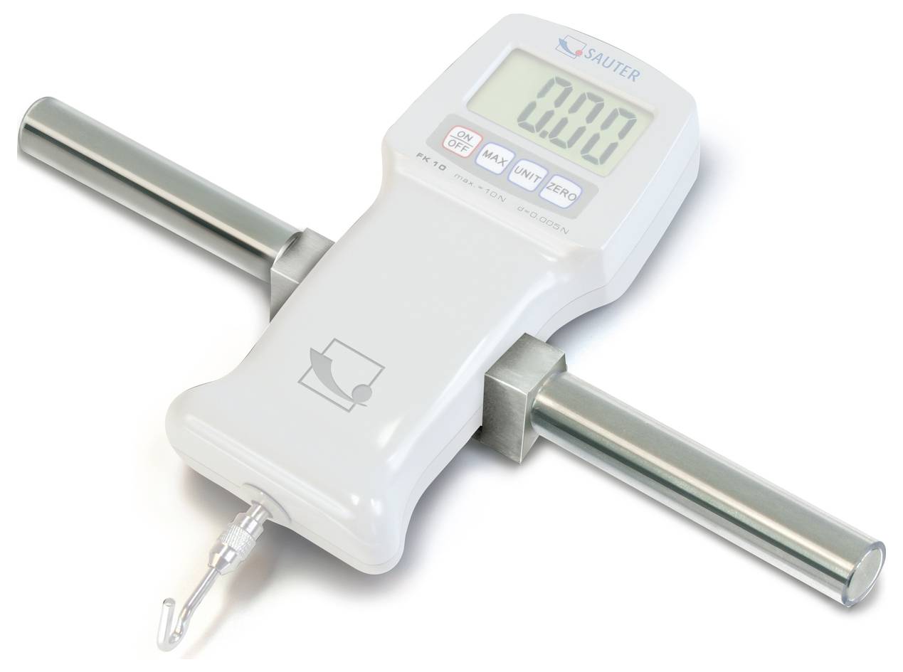 Digitale krachtmeter met haken en handgrepen voor spanningsmetingen. Display toont '0.00'. Merknaam bovenaan het apparaat.