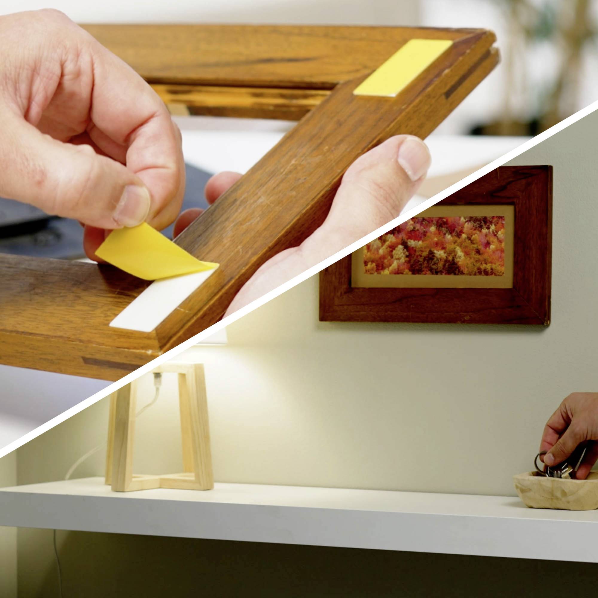 'Moeiteloos Schilderijen Ophangen' toont een persoon die een lijst bevestigt met een strip, en iemand die een gereedschap gebruikt om een lijst aan de muur af te stellen.