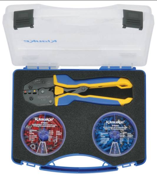 'Klauke' gereedschapset in een kunststof koffer, inclusief een krimpgereedschap en twee spoelen met kleurgecodeerde connectoren voor elektrotechnische taken.