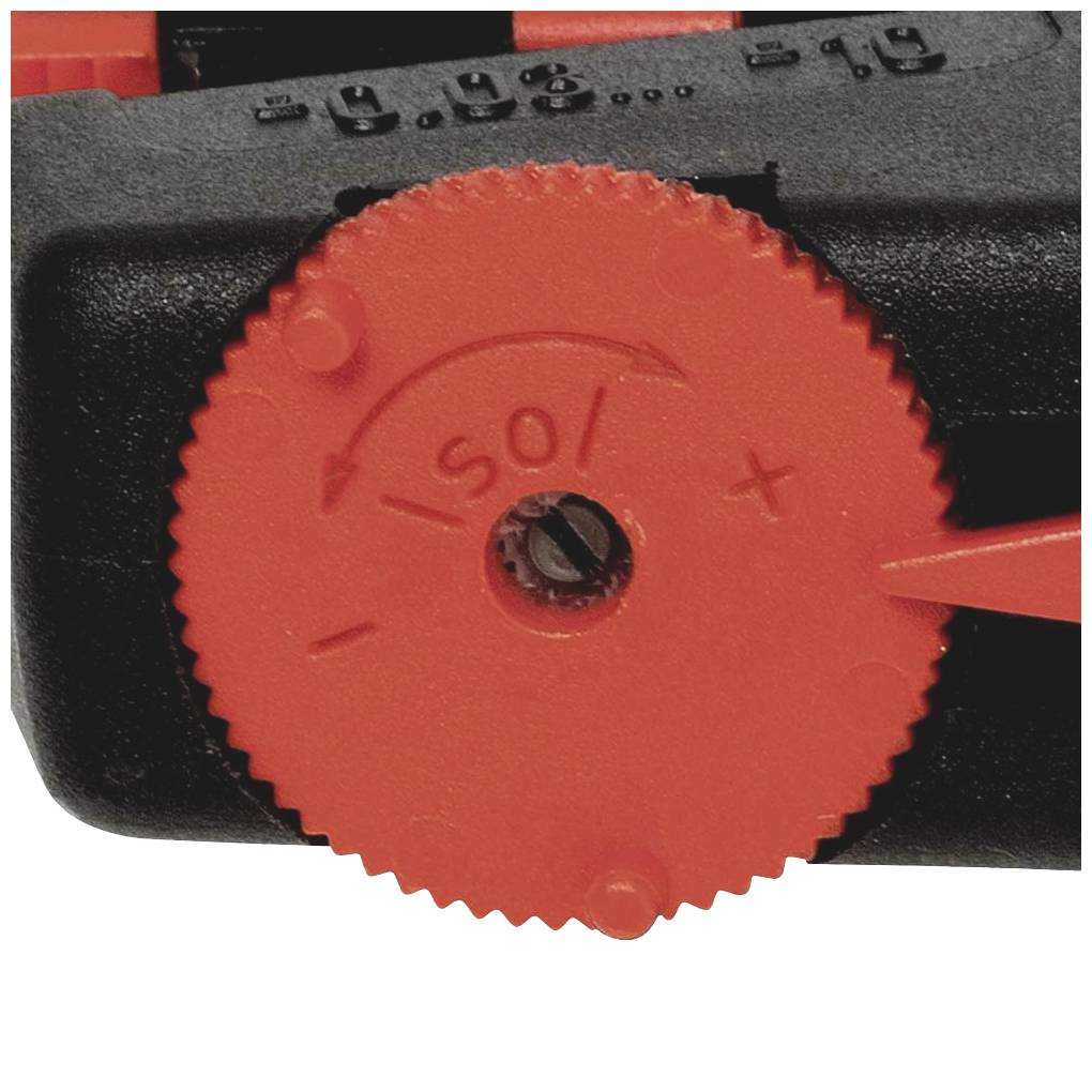 Close-up van een rood stelwiel op een zwart apparaat, gemarkeerd met 'S' plus en min, vermoedelijk voor afstelling.