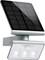 Zilveren solarlamp met rechthoekig zonnepaneel bovenaan en drie LED-verlichting eronder, geschikt voor wandmontage.