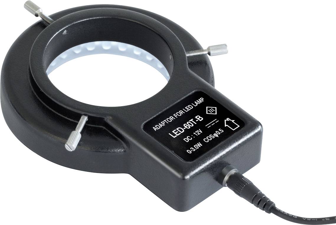 Ronde LED-ring met stroomkabel, zwarte behuizing, opschrift 'ADAPTER VOOR LED-LAMP LED-501-B 6V-12V 0.3W KLASSE 3' en waarschuwingen.