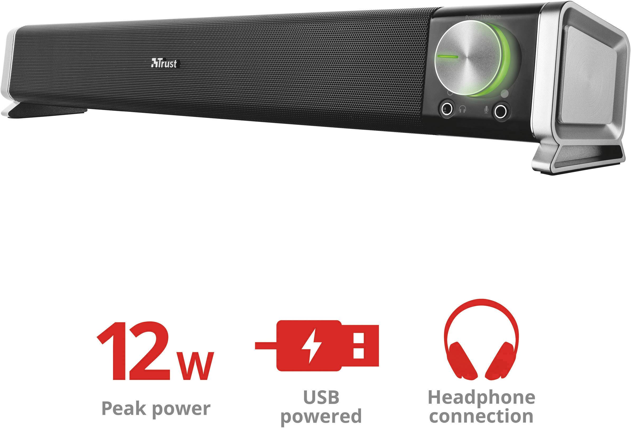 Zwarte soundbar met zilveren volumeregelaar en groene LED-indicator. Beschikt over 12W piekingangsvermogen, USB-voeding en een koptelefoonaansluiting.