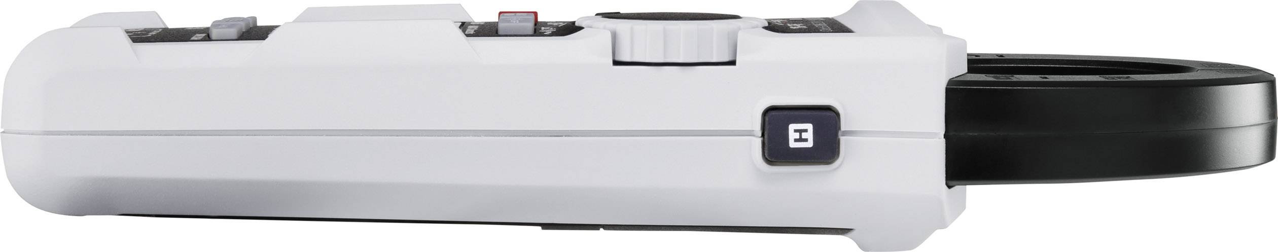 Grijs, compact elektronisch apparaat met knoppen en een zwart cirkelvormig onderdeel, waarschijnlijk een meetinstrument.