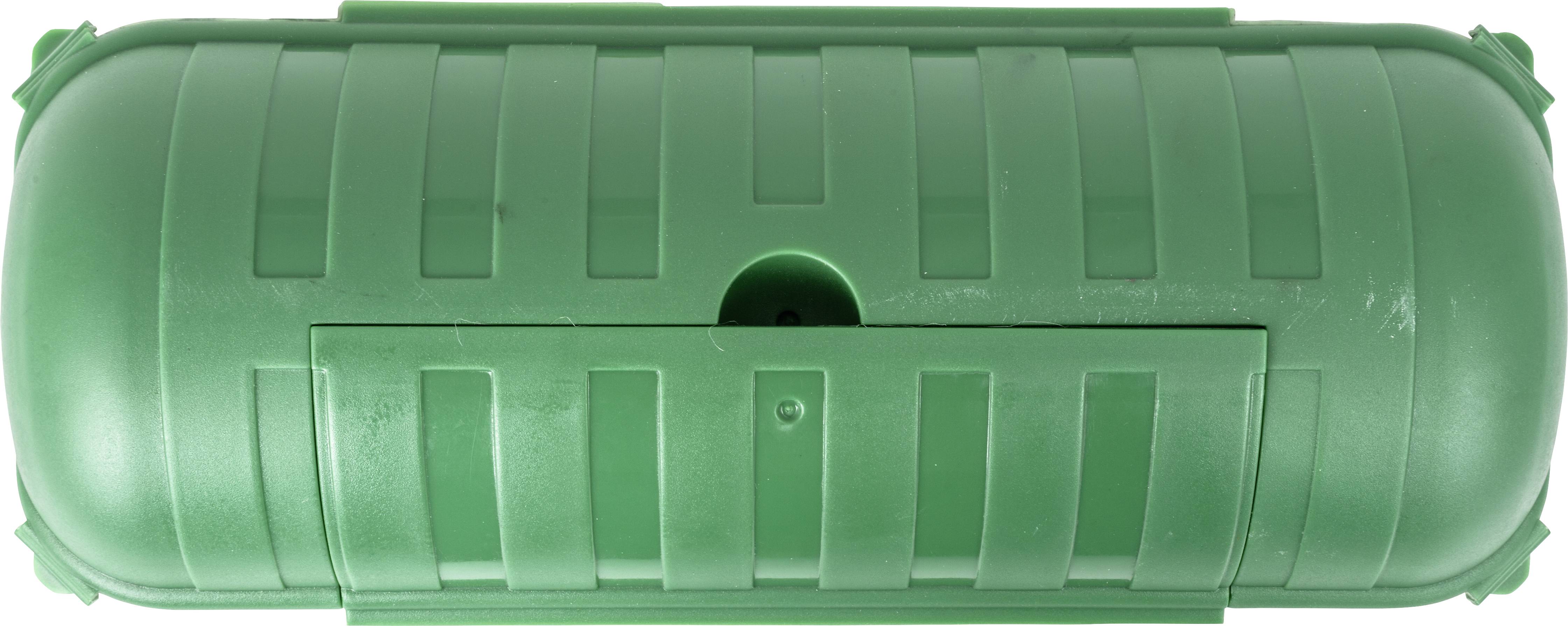 Een groen, cilindrisch behuizing met groeven, mogelijk een batterijvak of een onderdeel van een technisch apparaat.