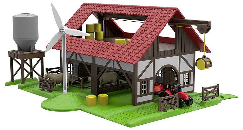 Een speelgoedboerderijset met een rode schuur met windmolen, silo en speelgoedsleepwagen. Inclusief hooibalen, schapen en een koe in het omheinde gebied.