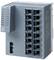 Een grijze industriële netwerkapparatuur met meerdere Ethernet-poorten en LED-indicatoren. De modelnaam "SCALANCE XC118" is zichtbaar op het apparaat.