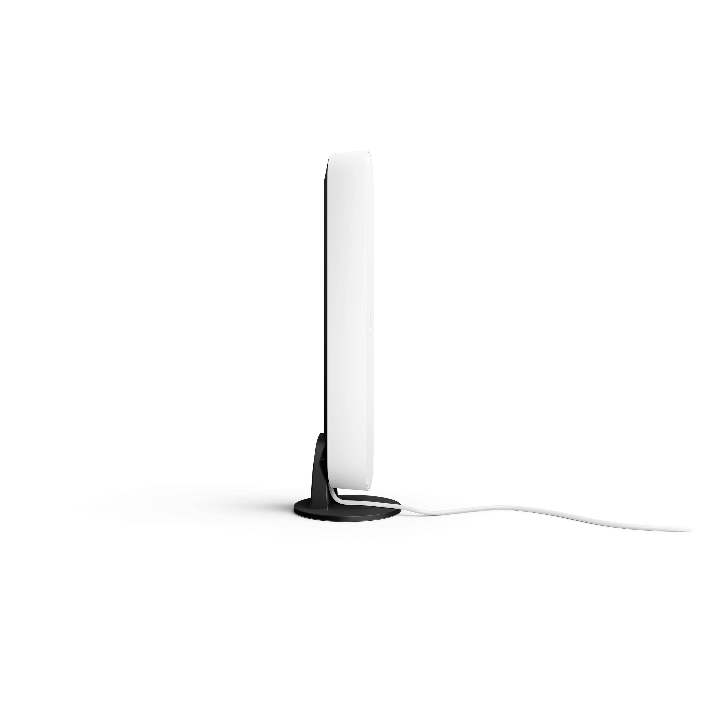 Een slanke, verticale monitor met een zwarte standaard en een witte rand. Aan de rechterkant loopt een wit snoer weg.