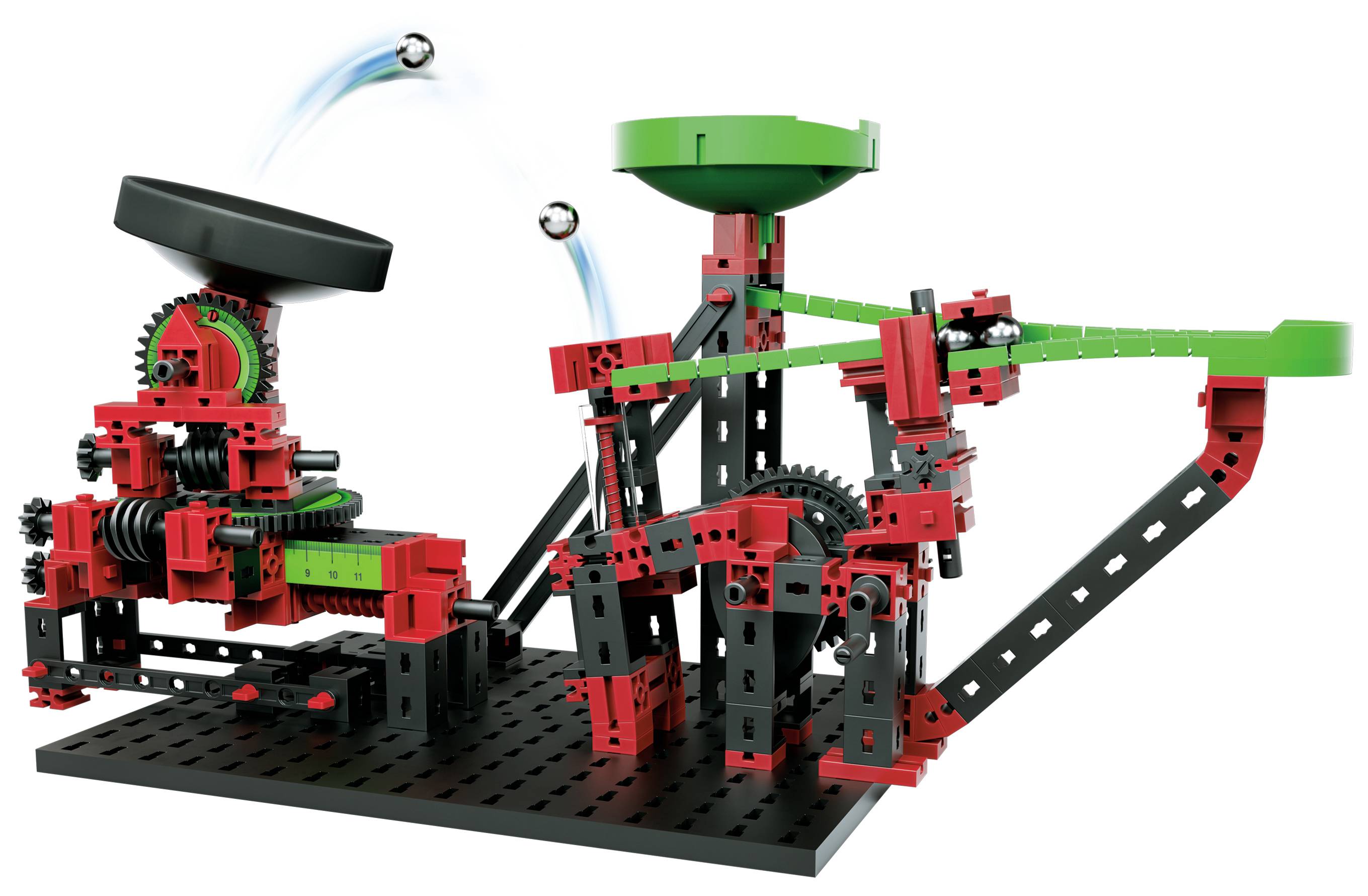 Een mechanische kogelbaan uit rode en zwarte onderdelen, waarbij een kogel over een helling schiet en in een trechter valt.