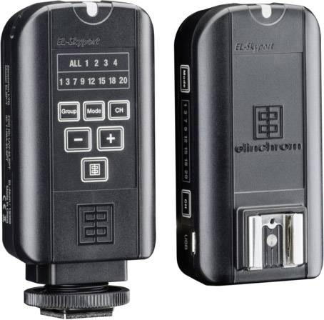 Een zwarte radio-ontvanger en -zender met display en knoppen voor het besturen van camera-flitsapparatuur. Merknaam 'EL-Skyport'.