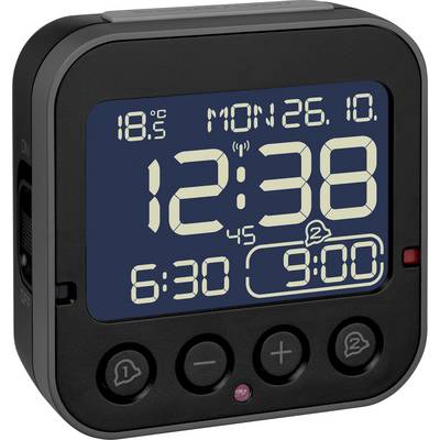 Elektronische wekker met digitaal display toont tijd '12:38', datum 'Maandag, 26.10.' en twee alarmtijden '6:30' en '9:00'.
