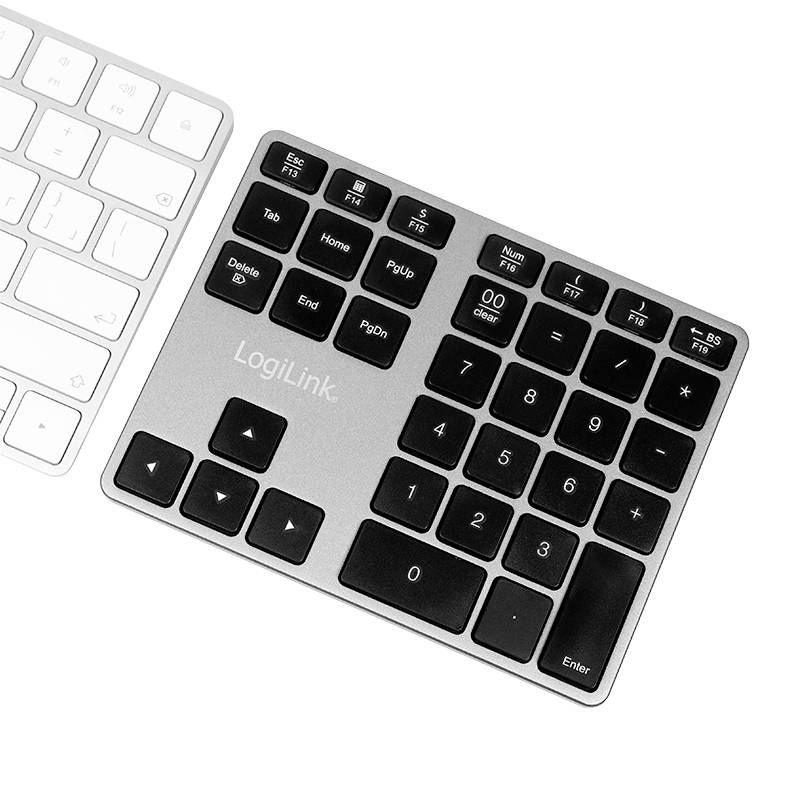 Twee toetsenborden: links een wit toetsenbord, rechts een compact, grijs numeriek toetsenblok van LogiLink met zwarte toetsen.