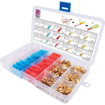 Plastic doos met vakken, gevuld met blauwe, rode en gouden kabelverbinders. Deksel toont gebruiksinstructies.