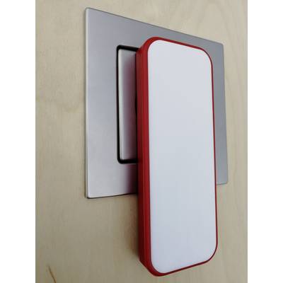 Een lichtschakelaar met een modern, rechthoekig ontwerp. De schakelaar heeft een rode rand en een witte voorkant.