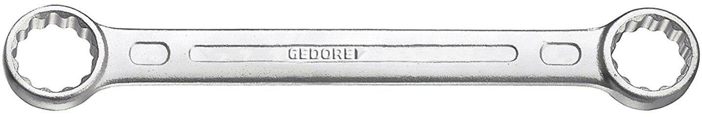 Een zilveren ringsleutel met het opschrift 'GEDORET' in het midden.