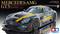 Racewagenmodel van een Mercedes-AMG GT3, grijs en geel met startnummer, gepresenteerd op een zwarte displayoppervlakte met merklogo.