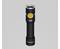Zaklamp met zwarte behuizing en oranje knop. Merk 'ARMYTEK' en model 'PRIME C2 PRO' zijn gedrukt.