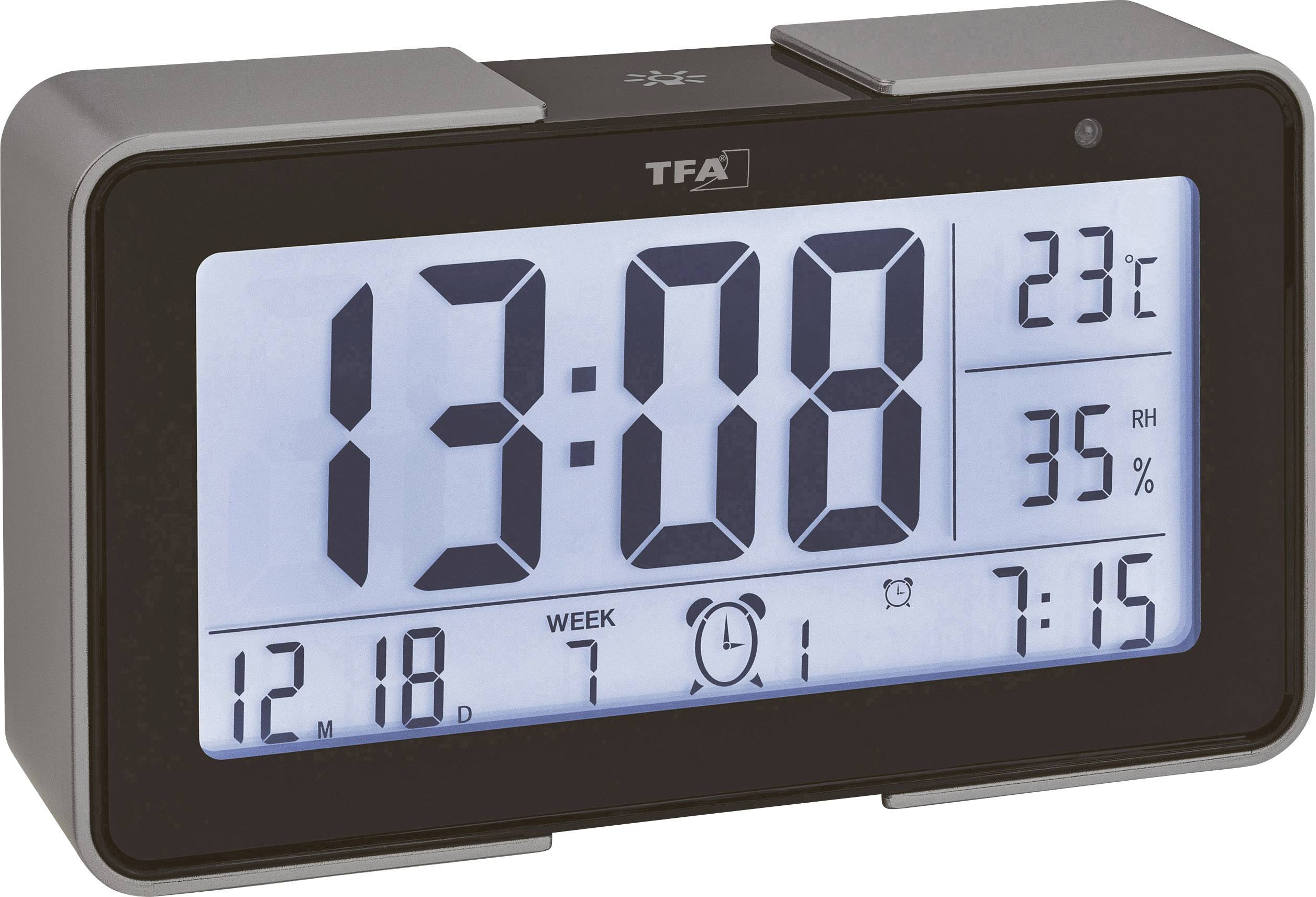 Een digitale wandklok toont de tijd 13:08, de temperatuur 23°C en de luchtvochtigheid 35%. Het is 18 december.