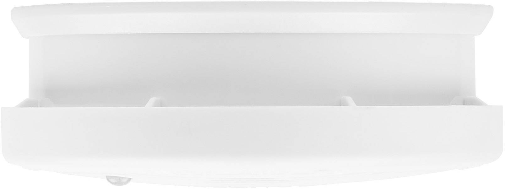 Een witte, cilindrische rookmelder met een gladde oppervlakte en minimalistisch design, gefotografeerd vanuit een zijaanzicht.