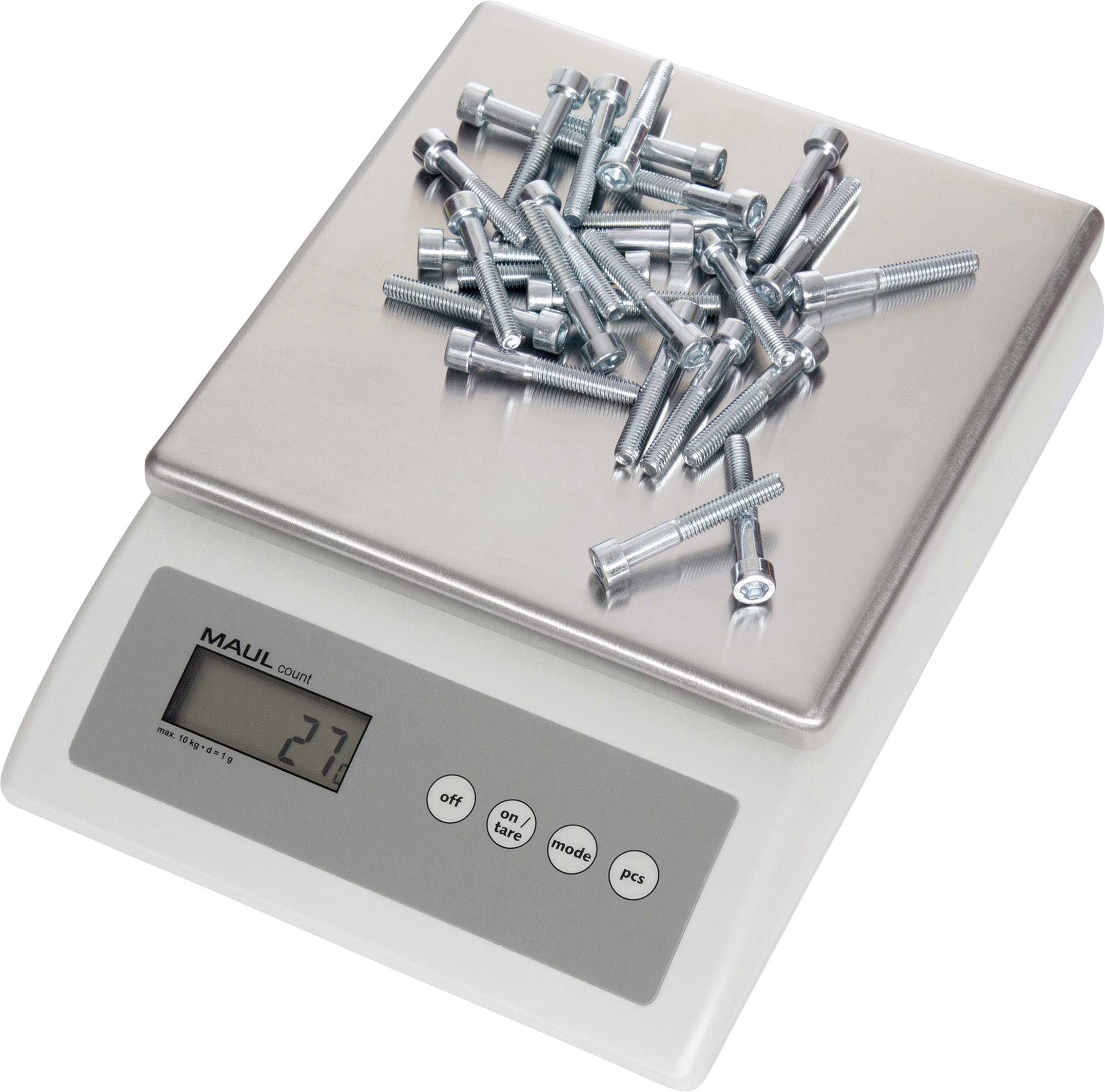 Een digitale keukenweegschaal toont een gewicht van 27 gram. Op de weegschaal ligt een stapel metalen bouten en schroeven.