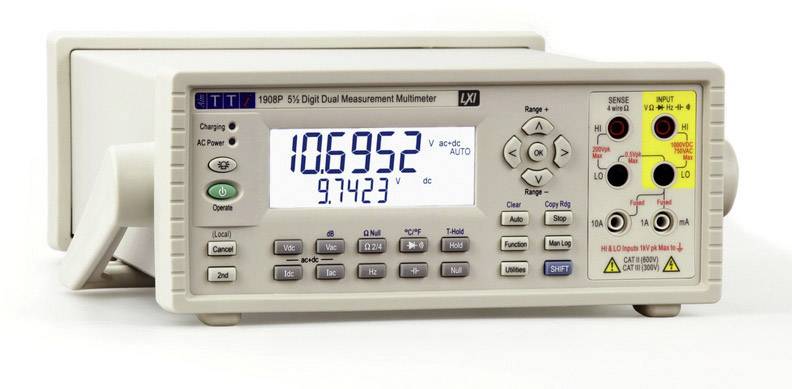 Digitaal multimeter met display toont meetwaarde '10,6952'. Knoppen en aansluitpunten voor verschillende meetfuncties aanwezig.