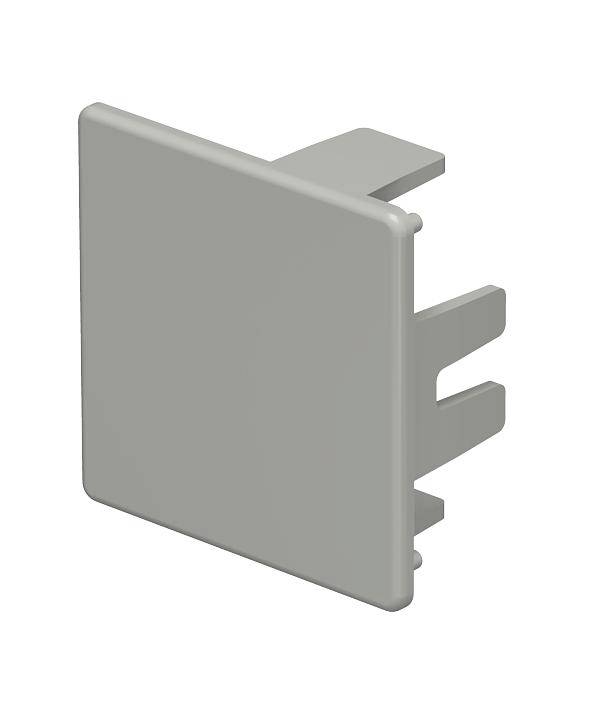 Grijze kunststof afsluiting met twee haken, mogelijk bedoeld voor het afdekken of afsluiten van elektrische aansluitingen of openingen.