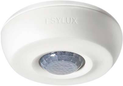 Een witte plafond bewegingsmelder met een heldere lens in het midden. Bovenaan is het woord 'ESYLUX' ingedrukt.