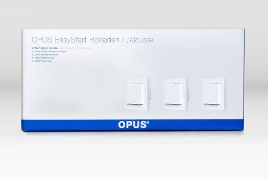 Verpakking van de 'OPUS EasyStart Rolluik/Zonwering'. Toont drie witte lichtschakelaars. Tekst informeert over eenvoudige installatie.