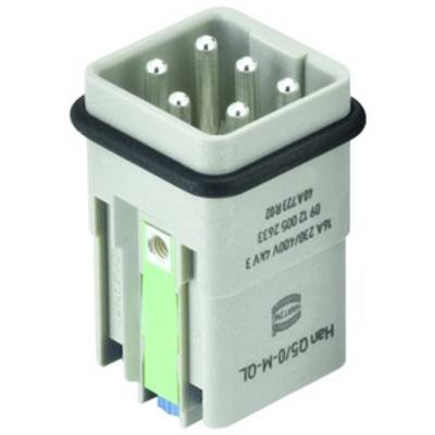 Een grijze elektrische connector met meerdere metalen pennen, zijdelingse markering en een groen detail, tegen een witte achtergrond.