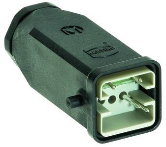 Een zwarte, rechthoekige stekker met een M-logo aan de bovenkant is zichtbaar.
