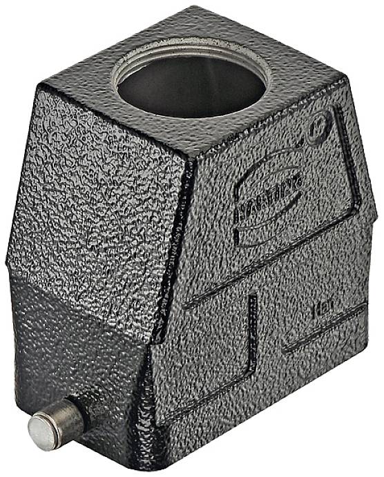 Zwarte, rechthoekige metalen blok met een gat bovenaan en gegraveerde lijnen, wordt gebruikt als mechanische component of bevestigingssteun.