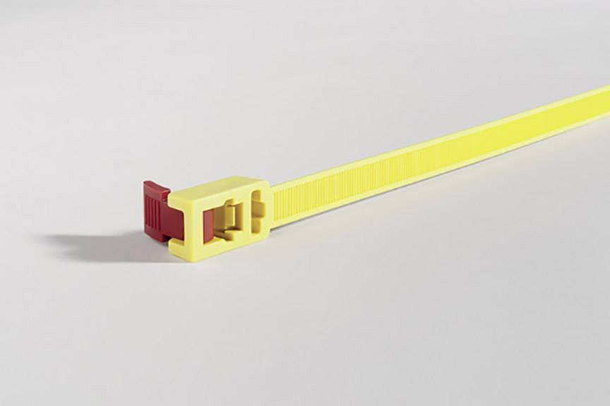 Gele kabelband met een rode sluiting op een grijze achtergrond.