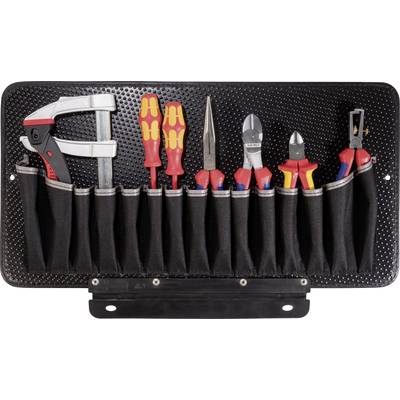 Gereedschapstafel met verschillende handgereedschappen: tang, schroevendraaier, stanleymes, zijkniptang en schroefklem, netjes opgeborgen in vakken.