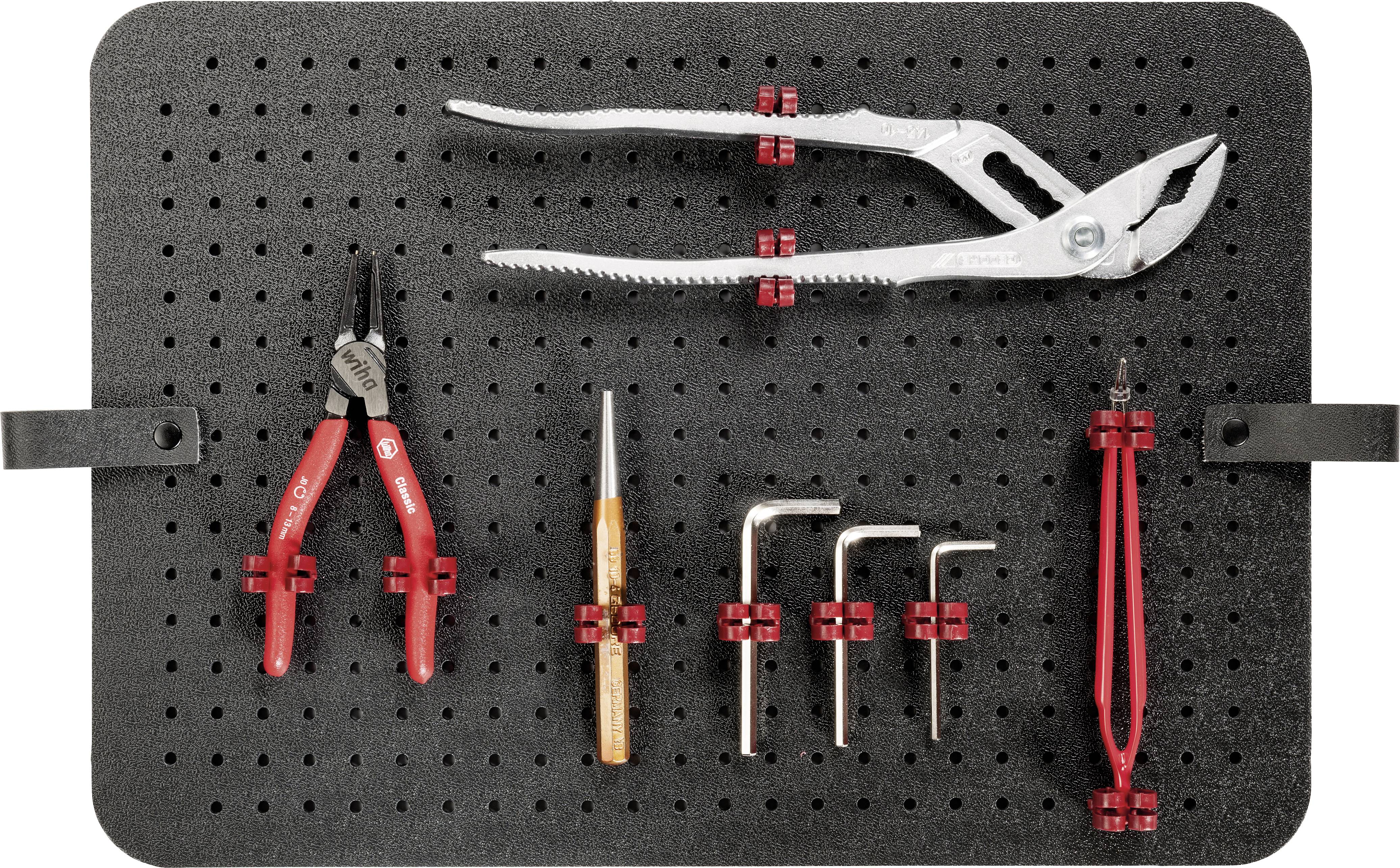 Een gereedschapsbord met verschillende gereedschappen: tang, schroevendraaier, inbussleutel en punttang, netjes gerangschikt.