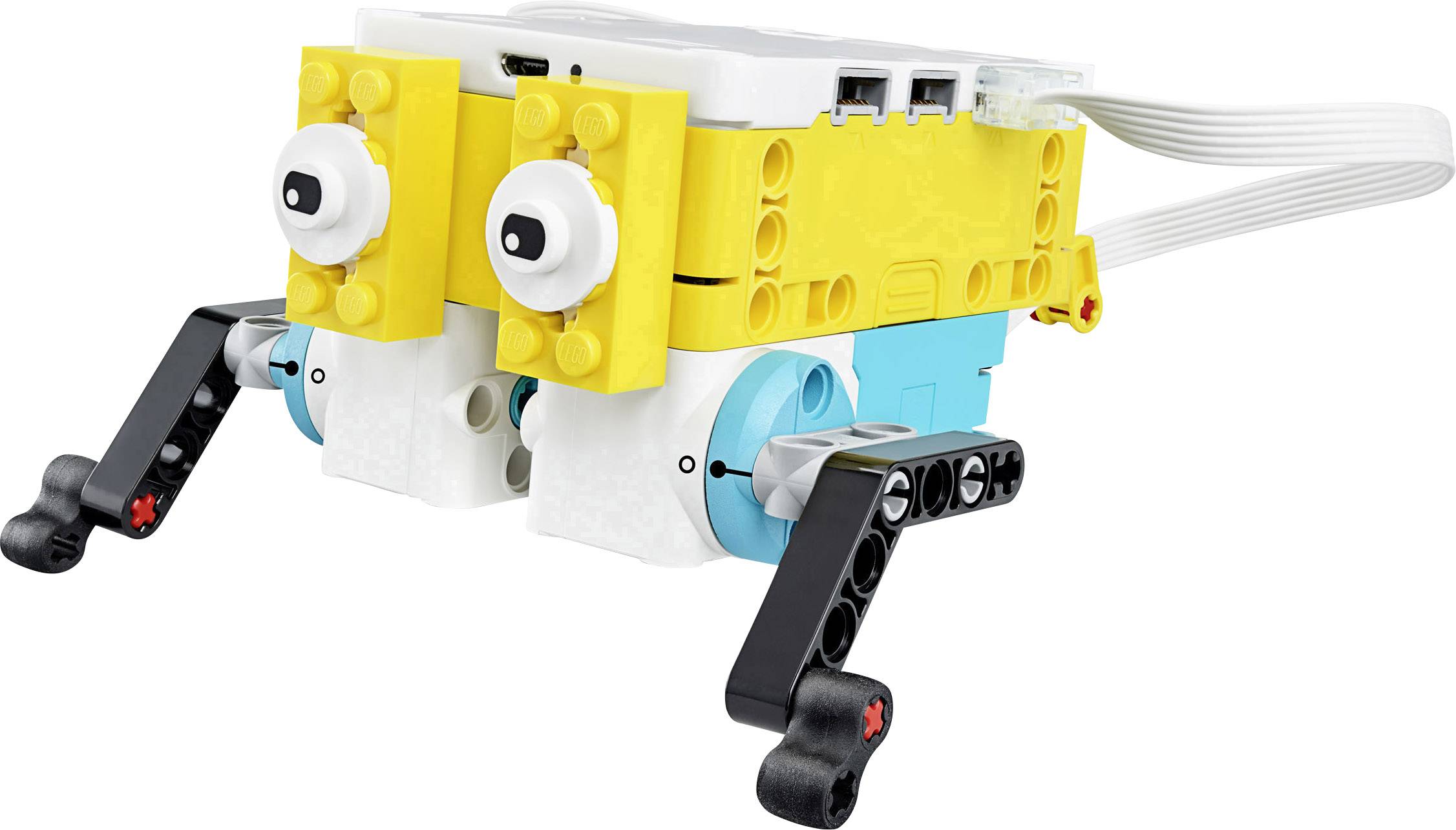 Een kleurrijke LEGO-robot met een geel en wit behuizing en zwarte voeten staat klaar om geprogrammeerd te worden.