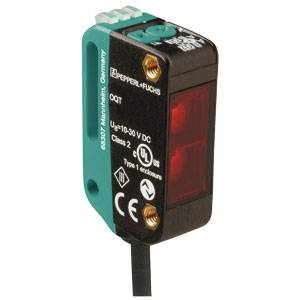 Lichtsluissensor in een robuuste behuizing, met fabrikants- en technologiespecificaties op de voorkant. Voeding: 10-30 V DC.