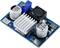 Elektronische module met koellichaam, condensatoren en potentiometer. Zou kunnen dienen voor spanningsregulatie of stroomvoorziening.