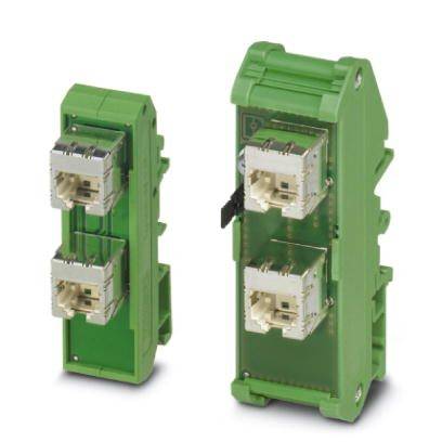 Twee groene stekkermodules, elk met twee witte aansluitingen. Links staat een module, rechts is een andere module gezien vanuit een zijaanzicht.