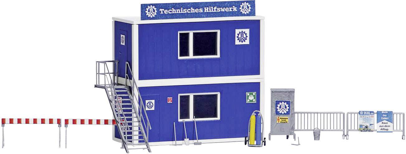 Blauw modelgebouw van het Technisches Hilfswerk met twee verdiepingen, voorzien van de tekst 'Technisches Hilfswerk', omgeven door afzettingen.