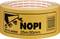 Een rol bruin pakketplakband van het merk 'NOPI', 25m lang en 50mm breed, met barcode en fabrikantcode 56175-00000.