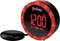 Zwarte en rode wekker met groot digitaal display '12:00'. Hij heeft een aangesloten trilalarm.