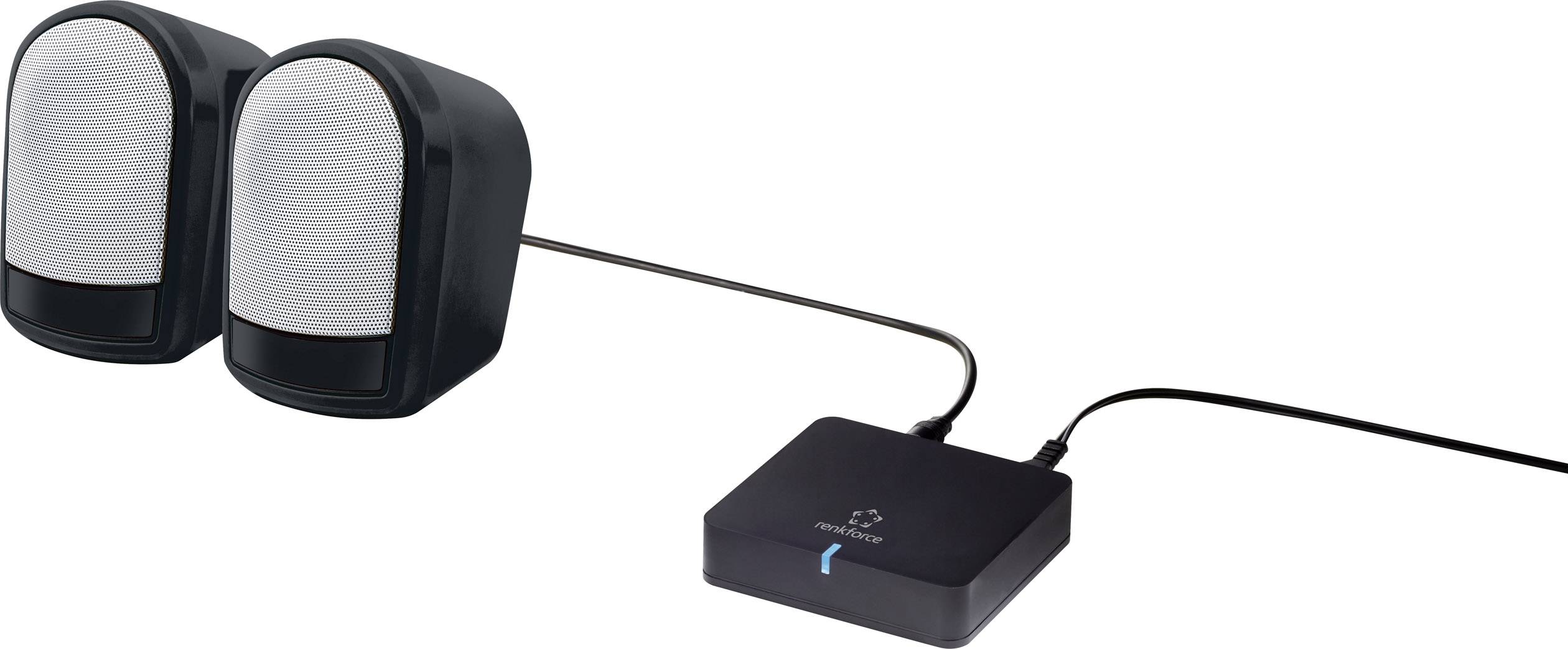 'Twee zwarte luidsprekers zijn verbonden met een compacte, rechthoekige audio-versterker die via een kabel van stroom wordt voorzien.'