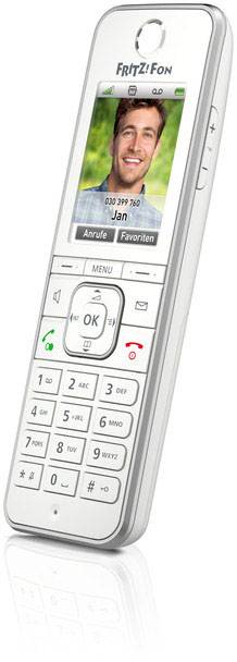 Draadloze telefoon met display toont een foto van een persoon, daaronder de naam 'Jan' en de opties 'Oproepen' en 'Favorieten'.