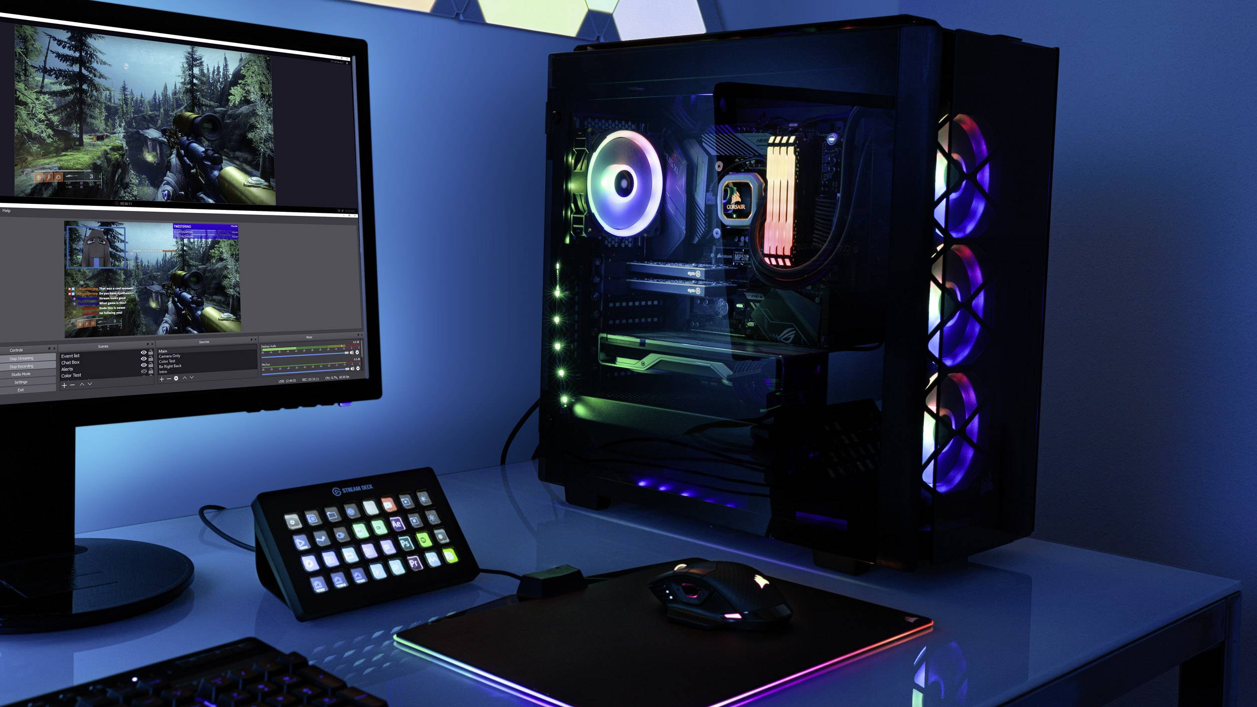 Een gaming-pc met RGB-verlichting staat op een tafel naast een monitor waarop een spel wordt weergegeven. Een besturingsapparaat ligt ernaast.