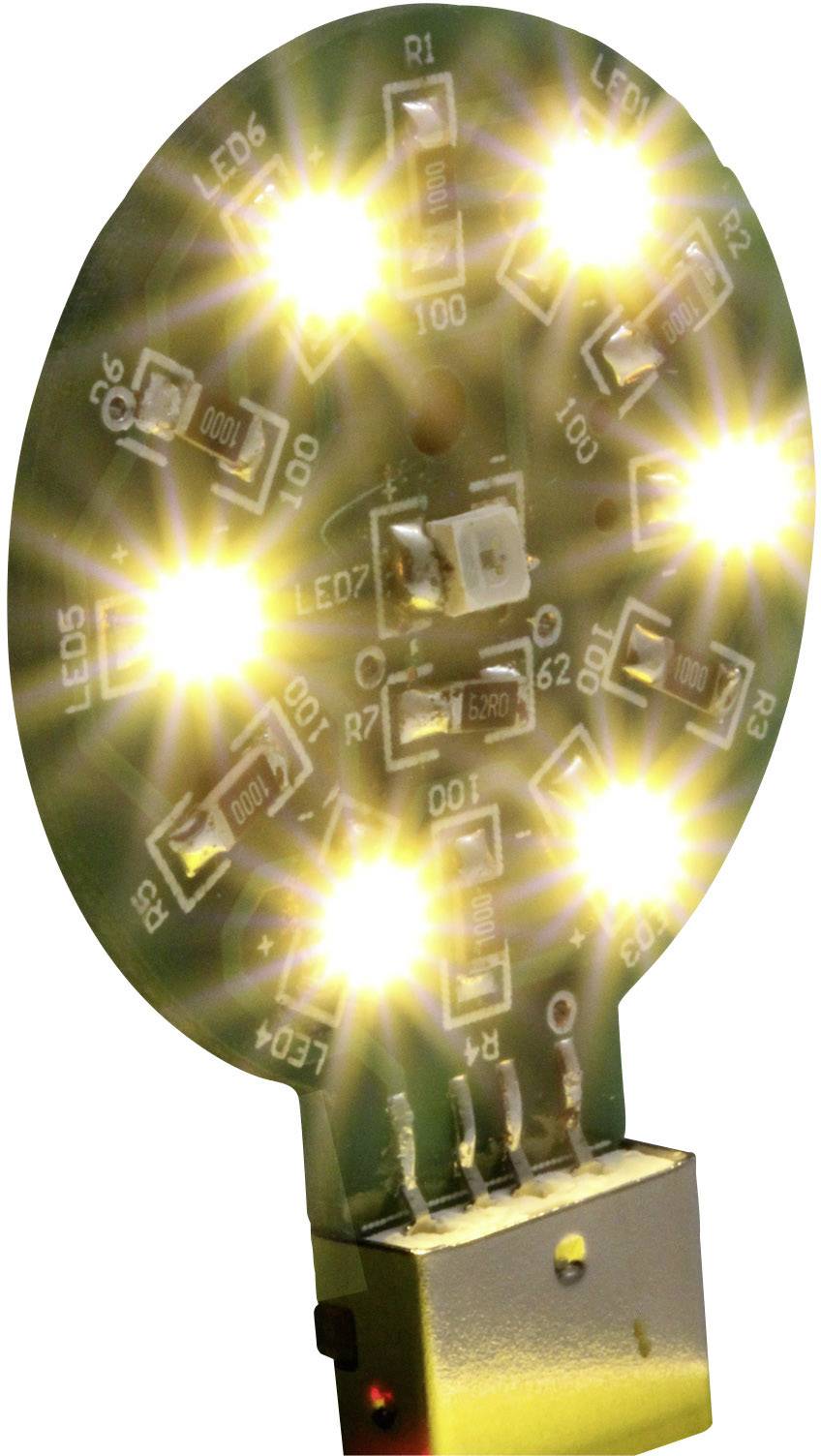 Ronde printplaat met zes oplichtende gele LED's, verbonden met een USB-aansluiting.