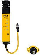 Veiligheidsschakelaar van PILZ met gele behuizing en zwart bovenste gedeelte, kabelaansluiting en aparte sensor.