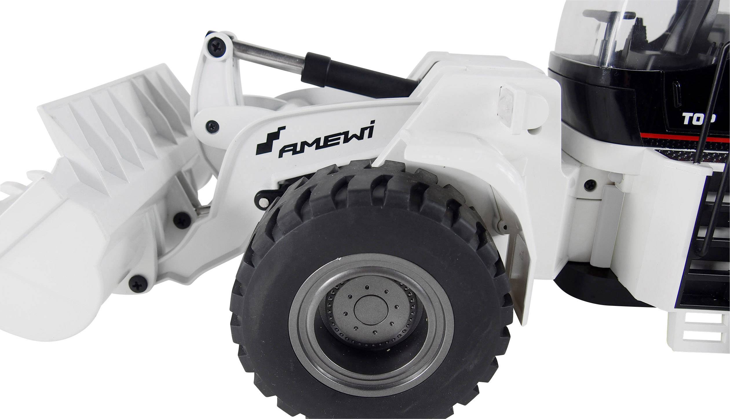 Witte speelgoed-shovel met zwarte en zilveren opschriften op de wielen, toont gedetailleerde nabootsing van bouwmaterieel.