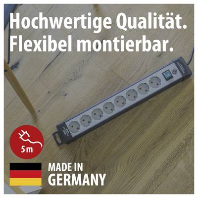 Stekkerdosenleiste op houten vloer met tekst 'Hoogwaardige kwaliteit. Flexibel monteerbaar.', 5 m en 'Made in Germany'.