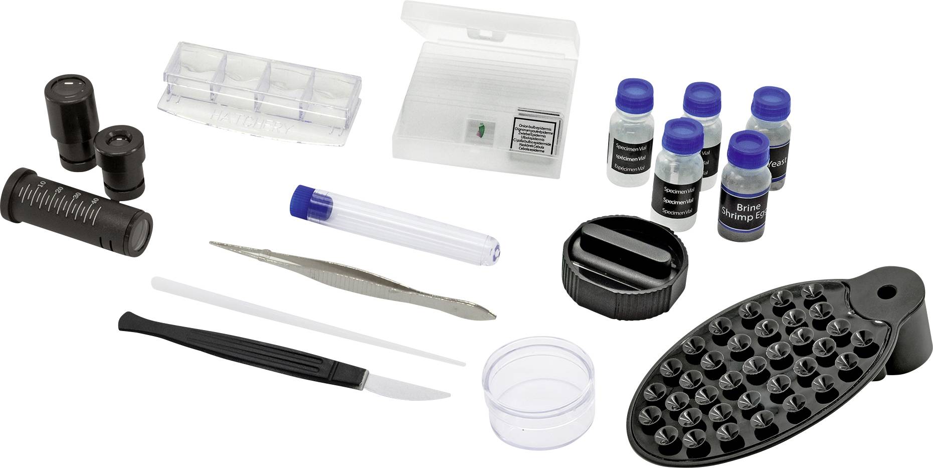 Een schadebepalingset met vergrootglas, pipetten, flesjes, pincet, scalpel en een zwarte kunststofplaat.