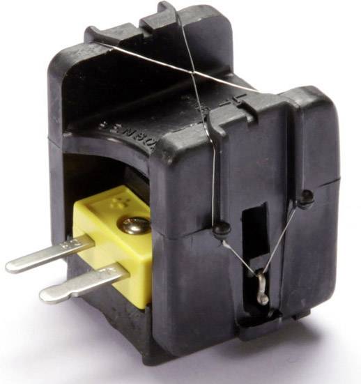Zwart kunststof onderdeel met een geel element en metalen klem. Het lijkt een elektrisch onderdeel of een zekering te zijn.
